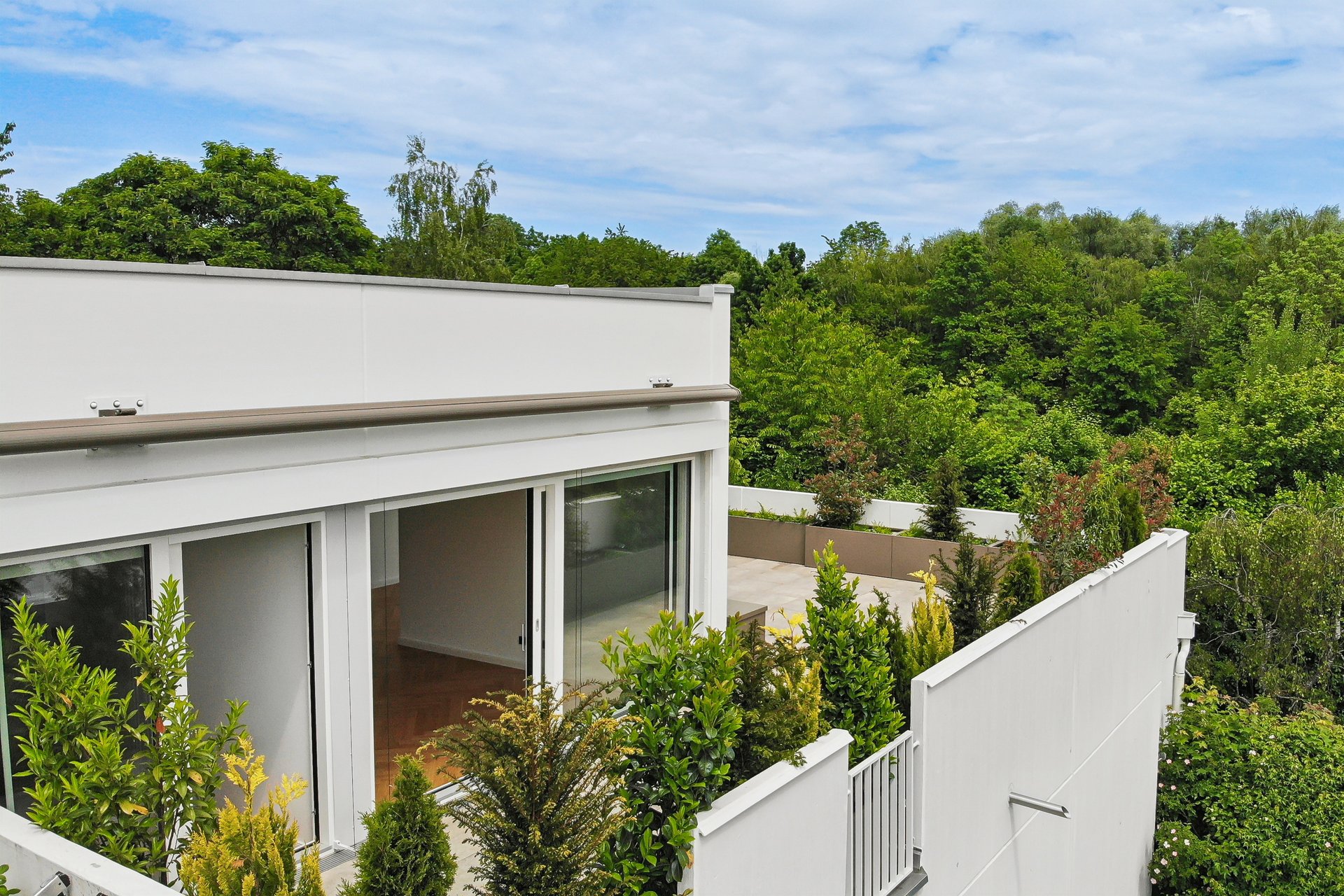 Penthouse in München-Bogenhausen mit Blick in einen Park