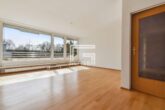 Sonnige Terrassenwohnung mit Parkblick - Wohnbereich