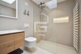 Parkblick in Bogenhausen – Kernsaniertes Design-Penthouse mit Sonnenterrasse - Badezimmer